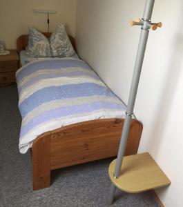 מיטה או מיטות בחדר ב-Ferienhaushälfte Domeyer Midlum