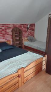
Łóżko lub łóżka w pokoju w obiekcie Apart - House
