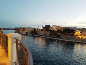 a view of a river from a bridge at Philos - Appartements & Rooms in Taranto