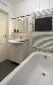 Et badeværelse på Apartment Ferienwohnung Blumenstadt