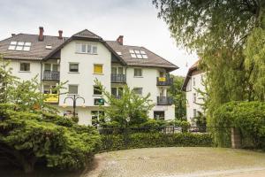 Vonkajšia záhrada v ubytovaní Apartament przy Deptaku z miejscem parkingowym