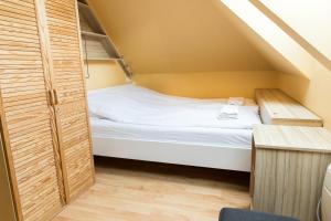 Posteľ alebo postele v izbe v ubytovaní Apartament przy Deptaku z miejscem parkingowym