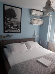 Ένα ή περισσότερα κρεβάτια σε δωμάτιο στο Rab-centar