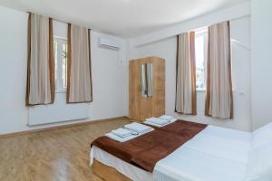 Voodi või voodid majutusasutuse Hotel Continental toas