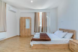 Voodi või voodid majutusasutuse Hotel Continental toas