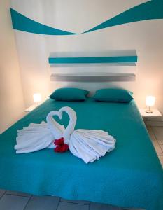Letto o letti in una camera di Abiki Mauritius
