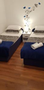 Posteľ alebo postele v izbe v ubytovaní Apartments Barac