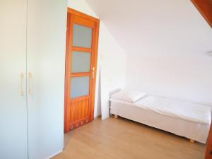 Łóżko lub łóżka w pokoju w obiekcie Słoneczny Dom pokoje i apartament na wynajem