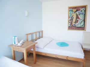 Łóżko lub łóżka w pokoju w obiekcie Słoneczny Dom pokoje i apartament na wynajem