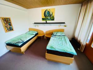 Postel nebo postele na pokoji v ubytování sleep24 - Monteur Zimmer In Eschelberg