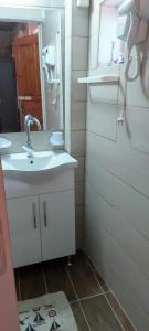 Koupelna v ubytování Mariaeva Rooms
