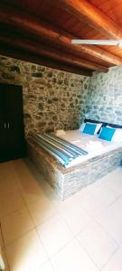 Postel nebo postele na pokoji v ubytování Mariaeva Rooms