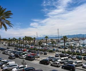 a parking lot filled with lots of parked cars at L'Ancora B&B in Milazzo