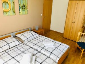 Postel nebo postele na pokoji v ubytování Apartmán Adam