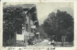 an old photo of a street with a house at "Terrasse" Nessental in Gadmen