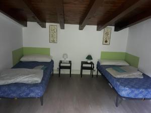 Postel nebo postele na pokoji v ubytování Albergue Casa Txakainlo