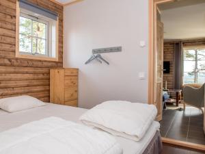 Voodi või voodid majutusasutuse Alpstigen 8B toas