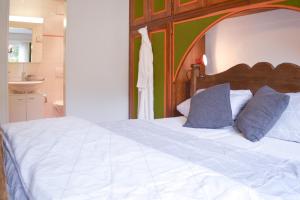 Łóżko lub łóżka w pokoju w obiekcie Feriendomizil inmitten der Berge inkl. Pool und Sauna