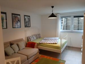 Postel nebo postele na pokoji v ubytování Jollen Apartments
