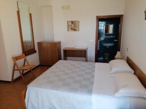 Ένα ή περισσότερα κρεβάτια σε δωμάτιο στο Camere da Anna Maria