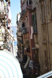 a view of a street with buildings and the ocean at CriSè Home in Naples