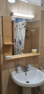 Koupelna v ubytování Sinaia Relax Residence + 47 fotografií