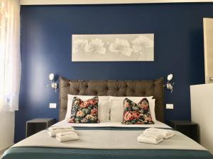 Letto o letti in una camera di Sunset rooms