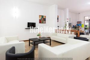 TV a/nebo společenská místnost v ubytování Hotel Kennedy