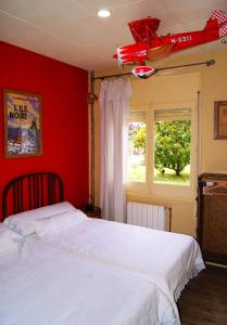 Ένα ή περισσότερα κρεβάτια σε δωμάτιο στο Apartamento con encanto Can Brugada