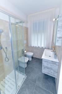 Et badeværelse på Appartamento Lido Mare