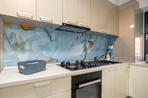 Фотография из галереи Blue Boutique Magic View of the Sea Apartments в Мамае