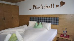 Postel nebo postele na pokoji v ubytování Pfurtschell