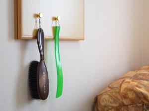 Postel nebo postele na pokoji v ubytování Nagoya Sakae Green Hotel