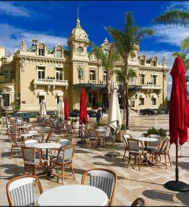 an outdoor seating area in front of a building at Home for 2 few steps from casino monte carlo and beach in Beausoleil