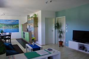 Televisyen dan/atau pusat hiburan di Apartment 541