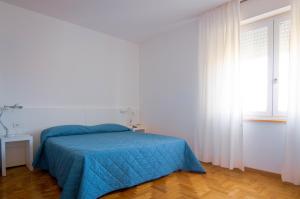 Posteľ alebo postele v izbe v ubytovaní Hotel Mistral