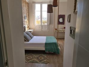 Cama o camas de una habitación en Casa Kessler Barcelona