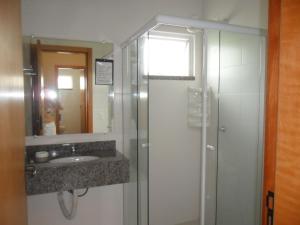 Ванная комната в Residencial Baía Bela