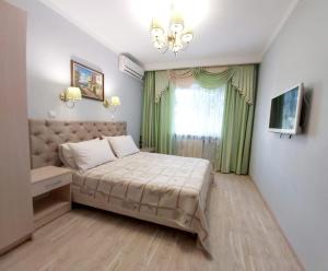 Voodi või voodid majutusasutuse Guest House on Priboynaya 6 toas