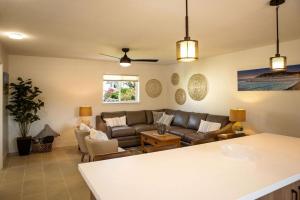 a living room with a couch and a table at 90 San Luis Street Unit D in Avila Beach