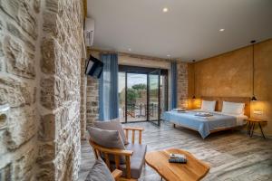 Posteľ alebo postele v izbe v ubytovaní Olive Luxury Suites - ADULTS ONLY