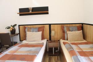 Postel nebo postele na pokoji v ubytování Villa Toscana