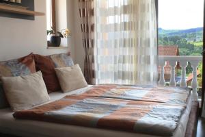 Postel nebo postele na pokoji v ubytování Villa Toscana