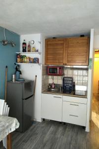 Köök või kööginurk majutusasutuses Studio cabine 605 avec vue sur la Cerdagne