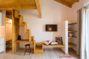 TV a/nebo společenská místnost v ubytování Vila Costa