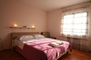 Postel nebo postele na pokoji v ubytování Apartments Grskovic G. Jesenovica