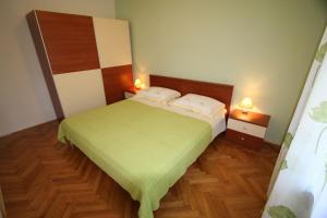 Postel nebo postele na pokoji v ubytování Apartments Grskovic G. Jesenovica