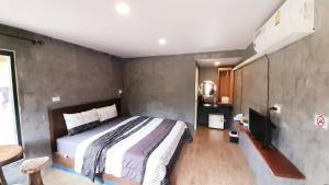 Cama o camas de una habitación en Rapeepat Residential and Resort