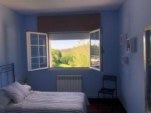 Postel nebo postele na pokoji v ubytování Apartamento Ultreia