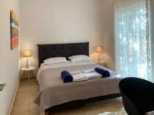 Postel nebo postele na pokoji v ubytování Villa Memories